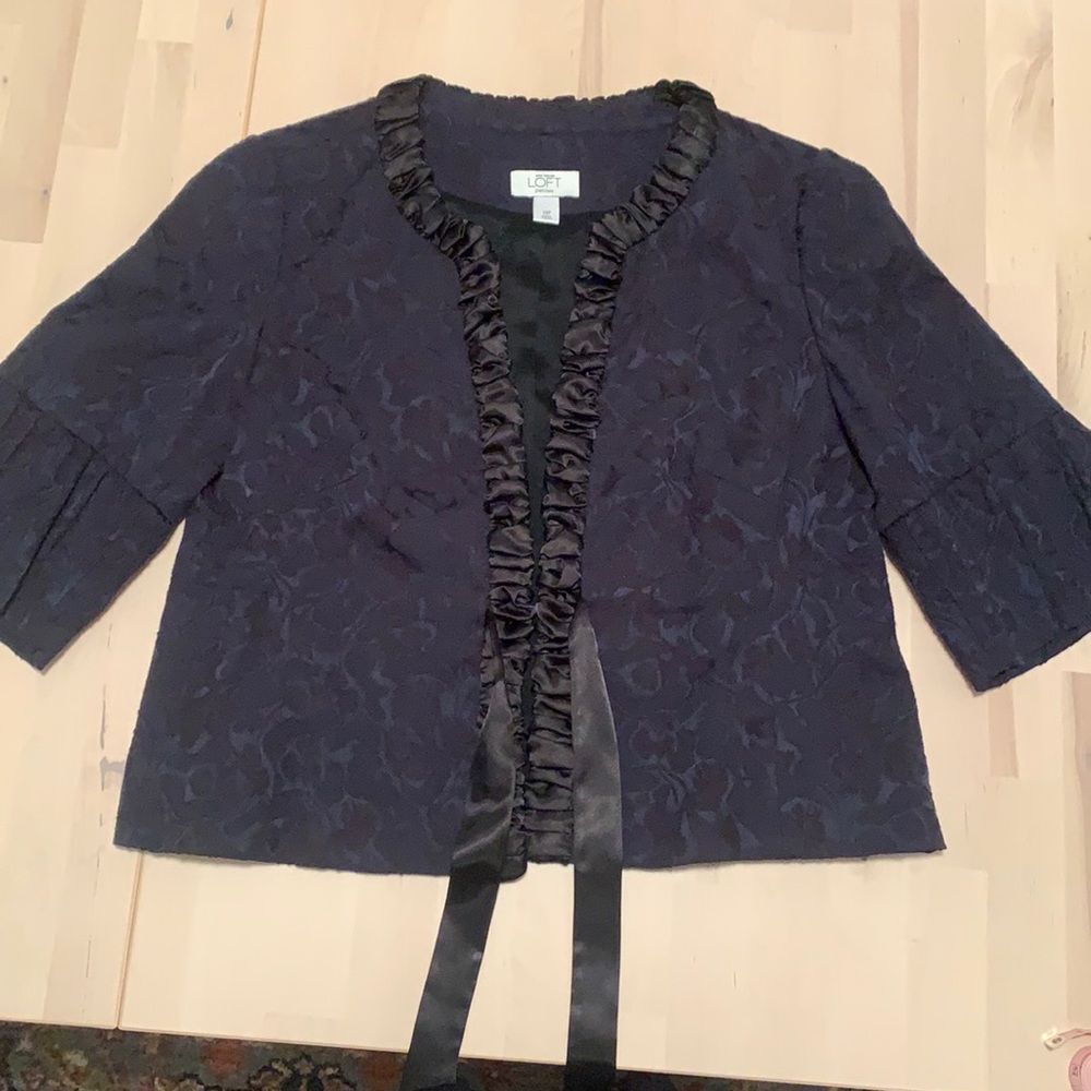 3/4 length sleeve jacket. Navy blue with black embroidery.